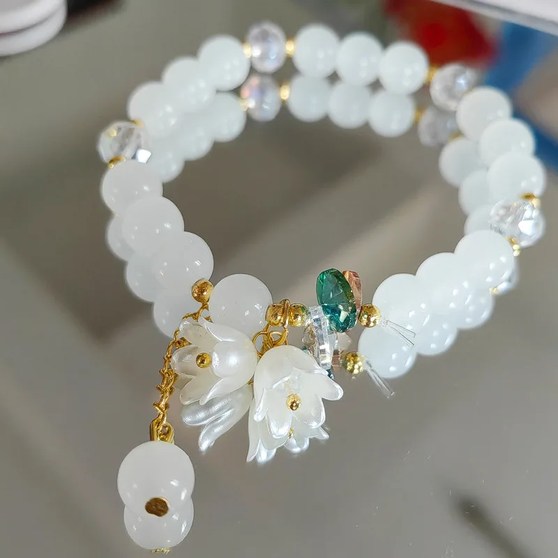 Interrupteur bracelet en perles de cristal vertes pour femme, breloque fleur de la vallée de ChimLily, élastique réglable, bijoux de mariage et d'anniversaire