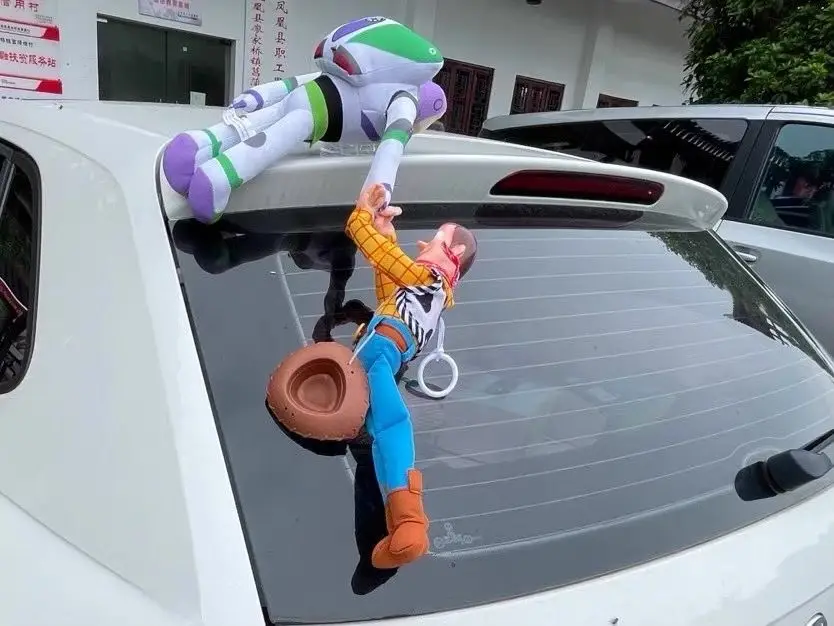 ToyStory Buzz Lightyear plush toy inside a car