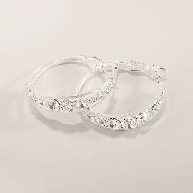 أقراط دائرية متدلية مرصعة بأحجار الزركون الأبيض 6