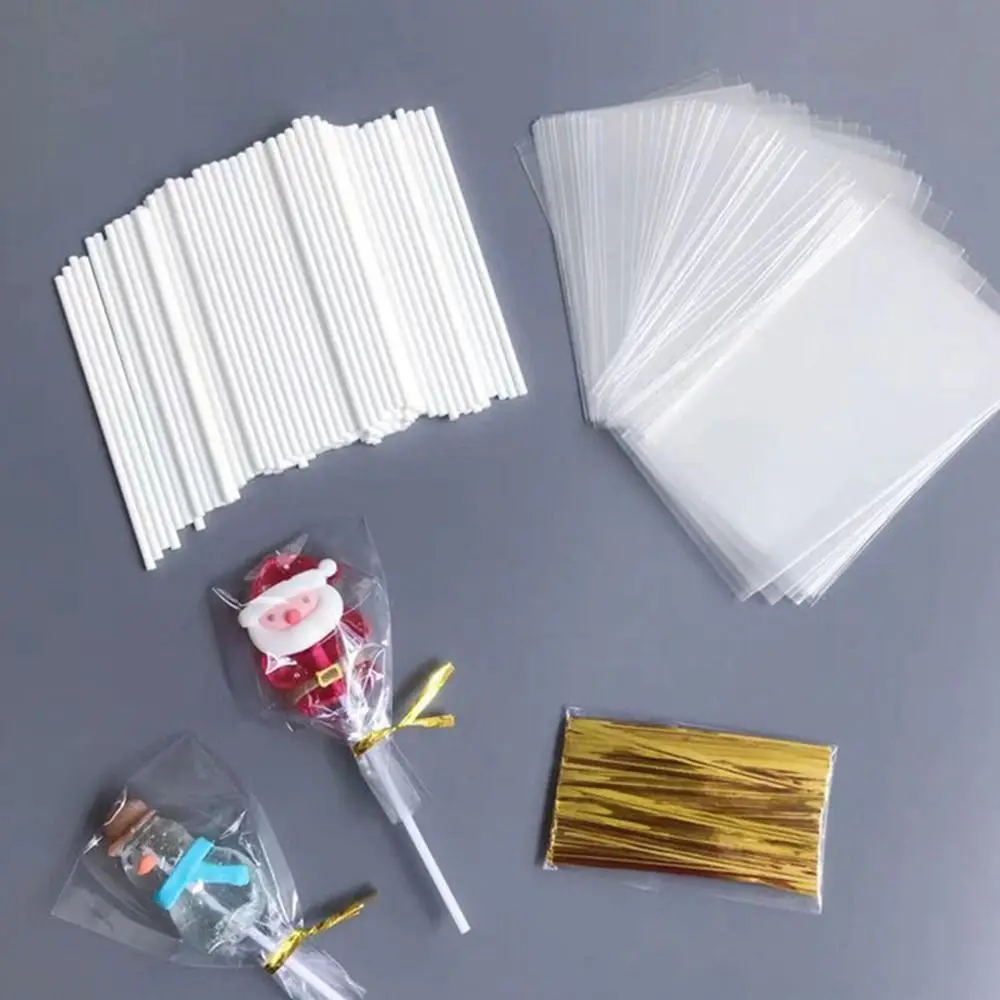 

1 Set White Sticks Cake Sticks Gold Twist Ties Transparent Parcel Bags Lollipop Sticks Plastic Cake Sticks and Wrappers