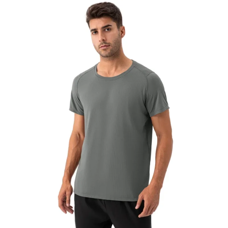 T-shirt casual larghe da uomo T-shirt da palestra a maniche corte T-shirt da corsa sportiva traspirante maschile T-shirt girocollo Camicie solide Abbigliamento uomo