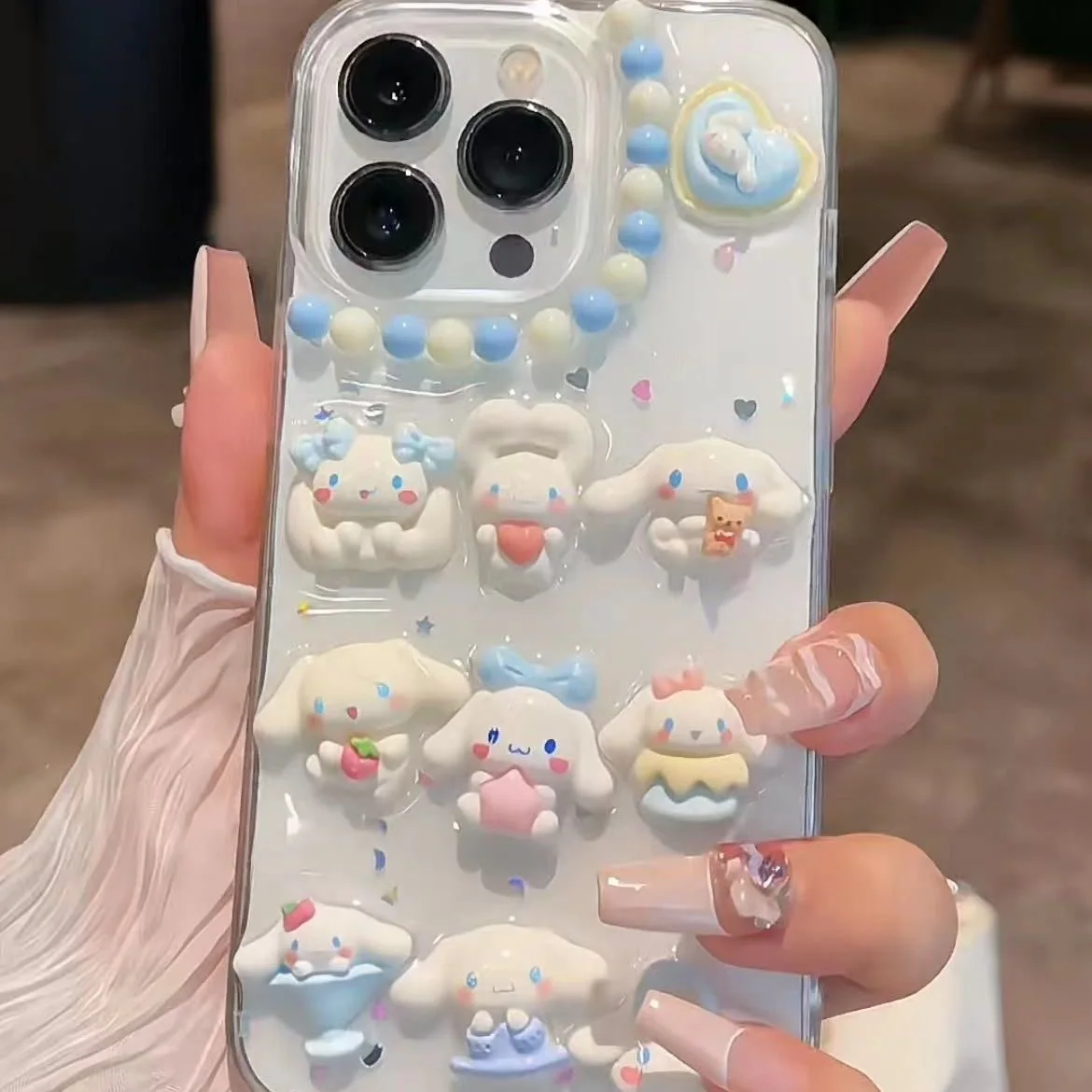 thumbnail image 1 of Sanrio-funda de teléfono 3D Cinnamoroll Hello Kitty Kuromi, carcasa a prueba de golpes para Iphone 11, 12, 13, 14, 15, Mini Pro Max, X, Xs, Xr, 7, 8 Plus, SE, 1 of 5
