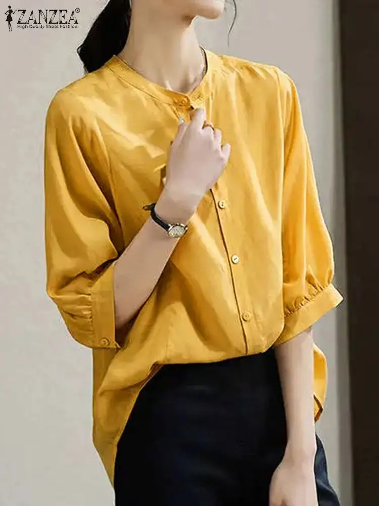 

Элегантная офисная блузка ZANZEA с воротником-стойкой, женская рубашка с пышными рукавами 3/4, корейская модная блузка на пуговицах, 2024, повседневные свободные однотонные Топы