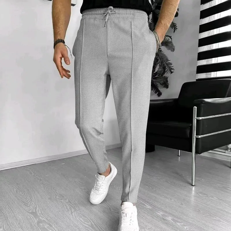 2024 Spring and Fall men's Waffle Leisure sports solid color pants trend fashion high quality drawstring small leg pants 5