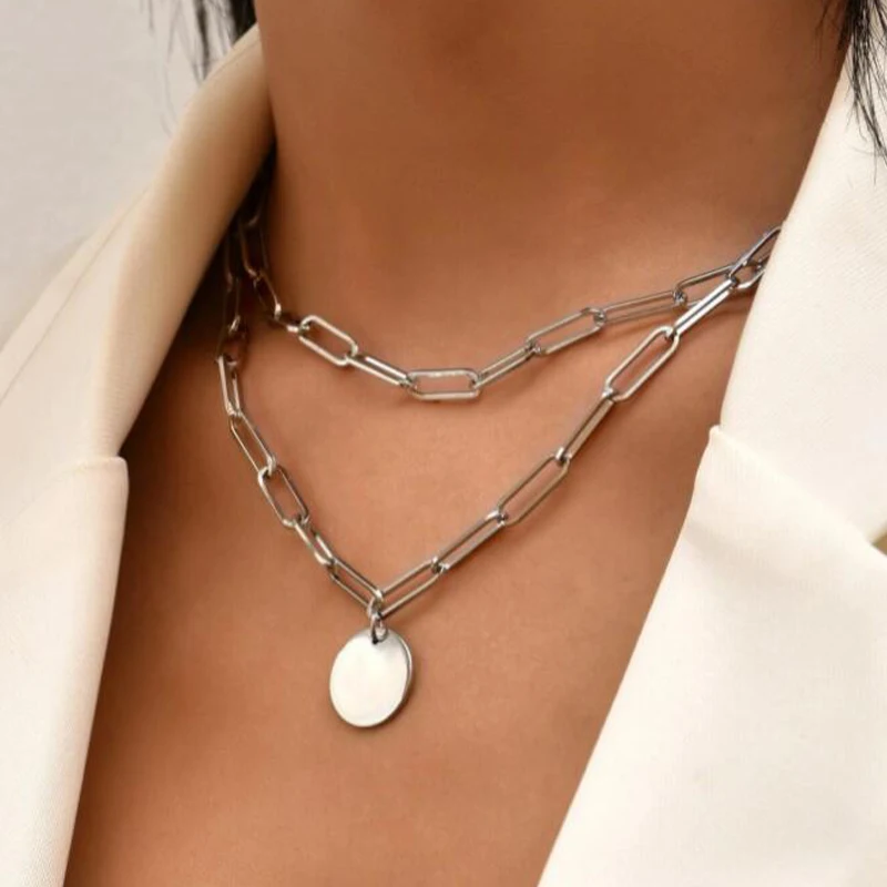 A woman is wearing a new Charm Layered Necklace for Women.