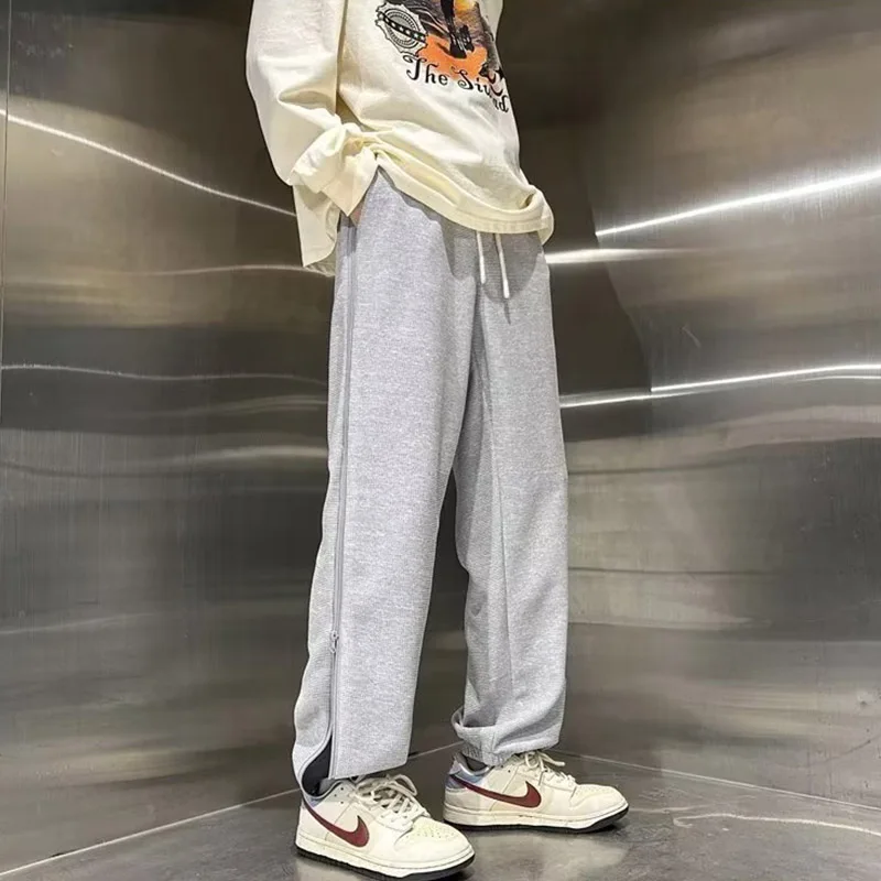 New Spring Checkered Pant Hem Zipper Split Large Size Trendy Travel Luxury Design For Men And Women With Strap Feet Casual Pants
