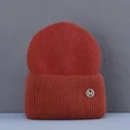 Orange red with M