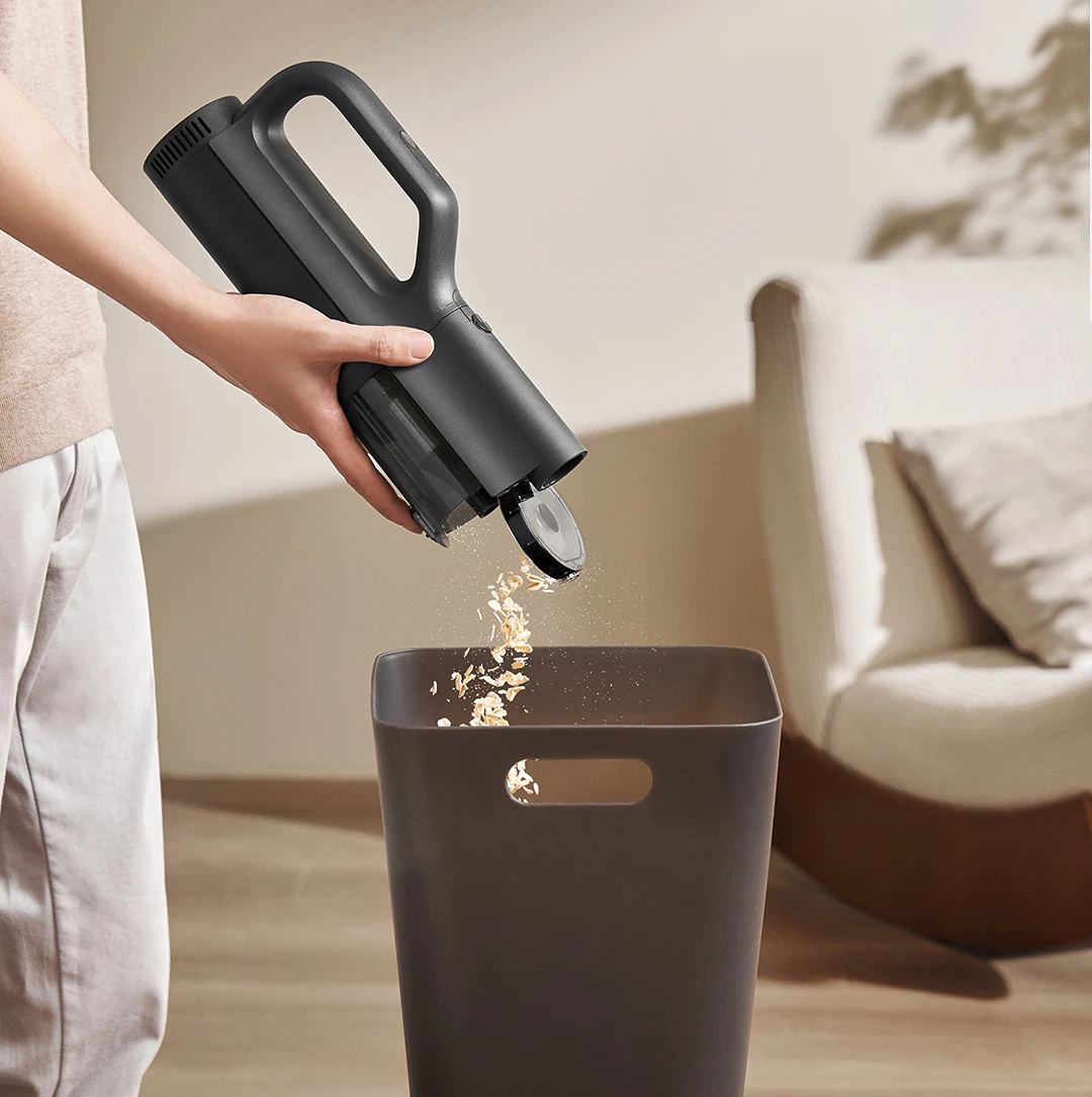 Aspirateur voiture puissant 21kPa Mijia 2400mAh, filtre HEPA visible et réservoir ouvert.