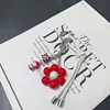 New South Korea Dongdaemun Gentle Cream Colored Leather Rope Contrasting Sun Flower Beads Phone Chain Keychain Bag Pendant 5