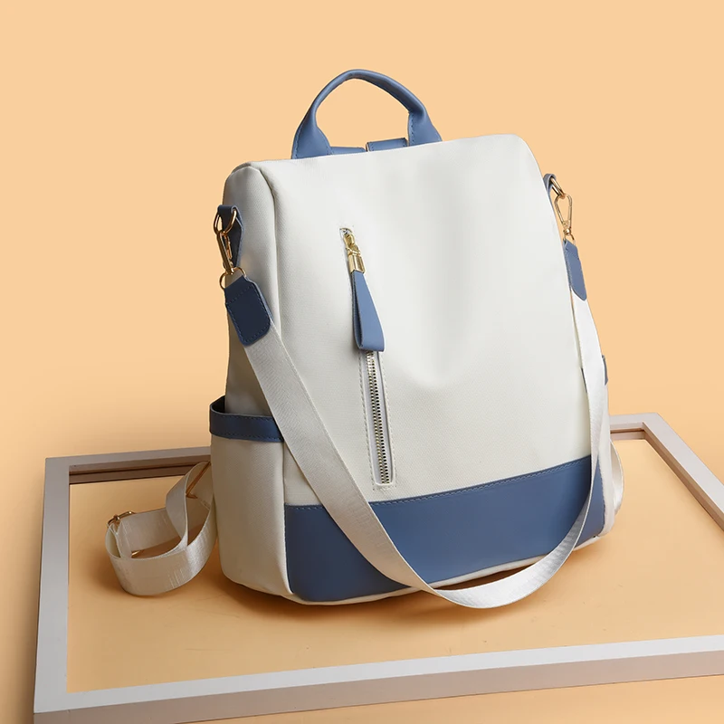 Women's travel backpack, large capacity, zipper closure, convertible shoulder bag design, perfect for school, work or travel