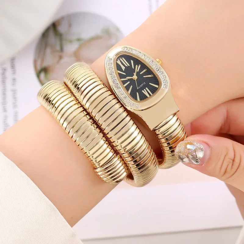 Serpentine Womens Quartz Watch: Diamond Inlaid Wrist
