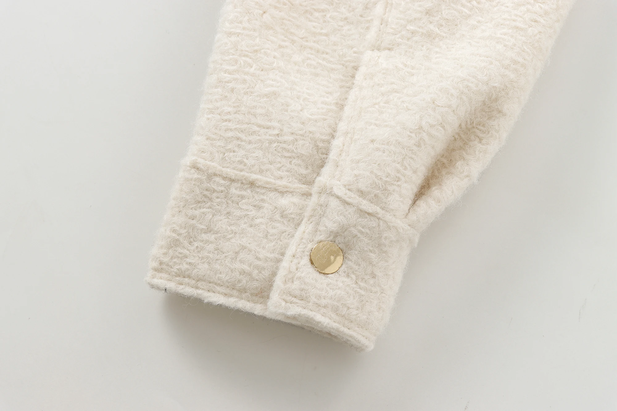 Back view of the regular fit cropped autumn outerwear.