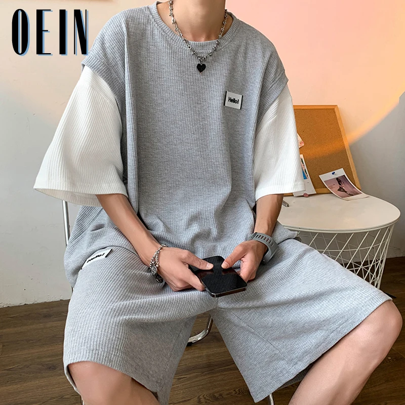 

Summer Men's Large Size Sports Suit Breathable Casual Wear Sets High Street Chic Fake Two-piece Casual Tshirt + Shorts Tracksuit