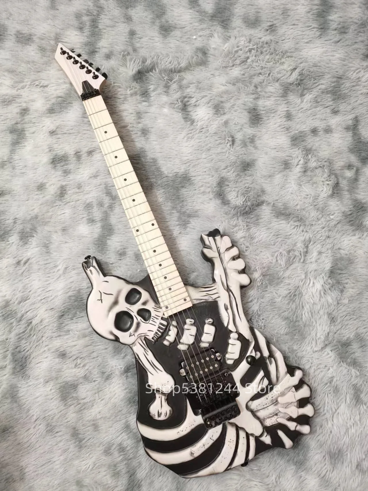 

Free transportation, skull electric guitar, maple fingerboard, customizable