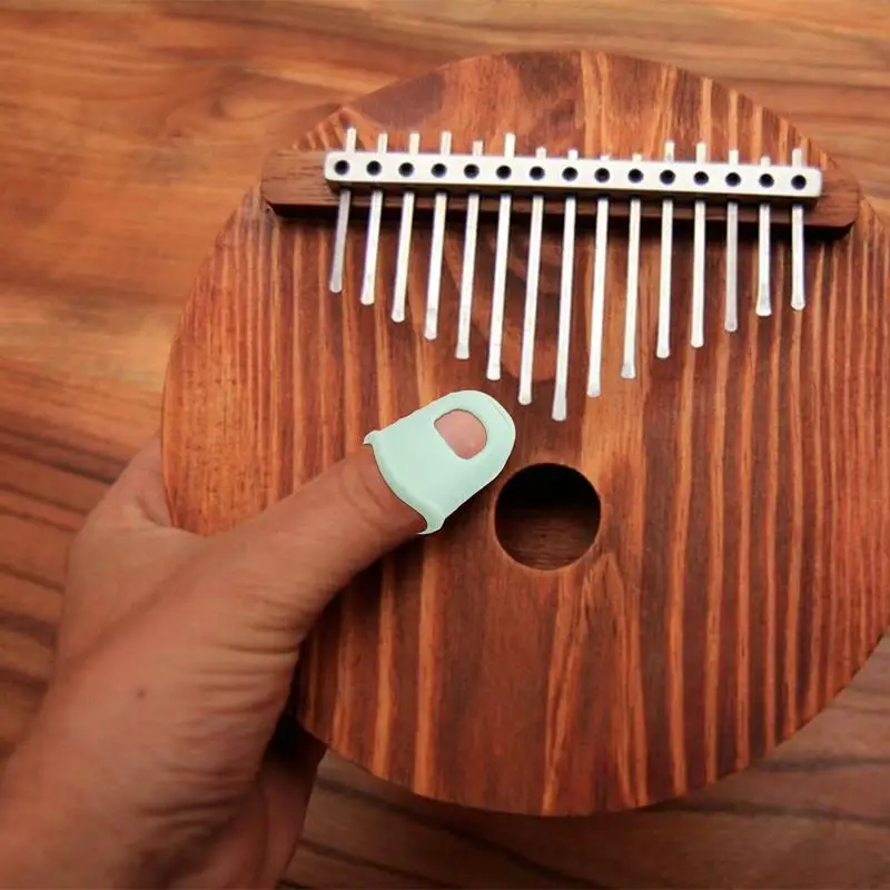

Колпачки для пальцев Kalimba, противоскользящие Защитные чехлы для пальцев, дышащие силиконовые защитные колпачки для пальцев Kalimba, для пальцев пианино
