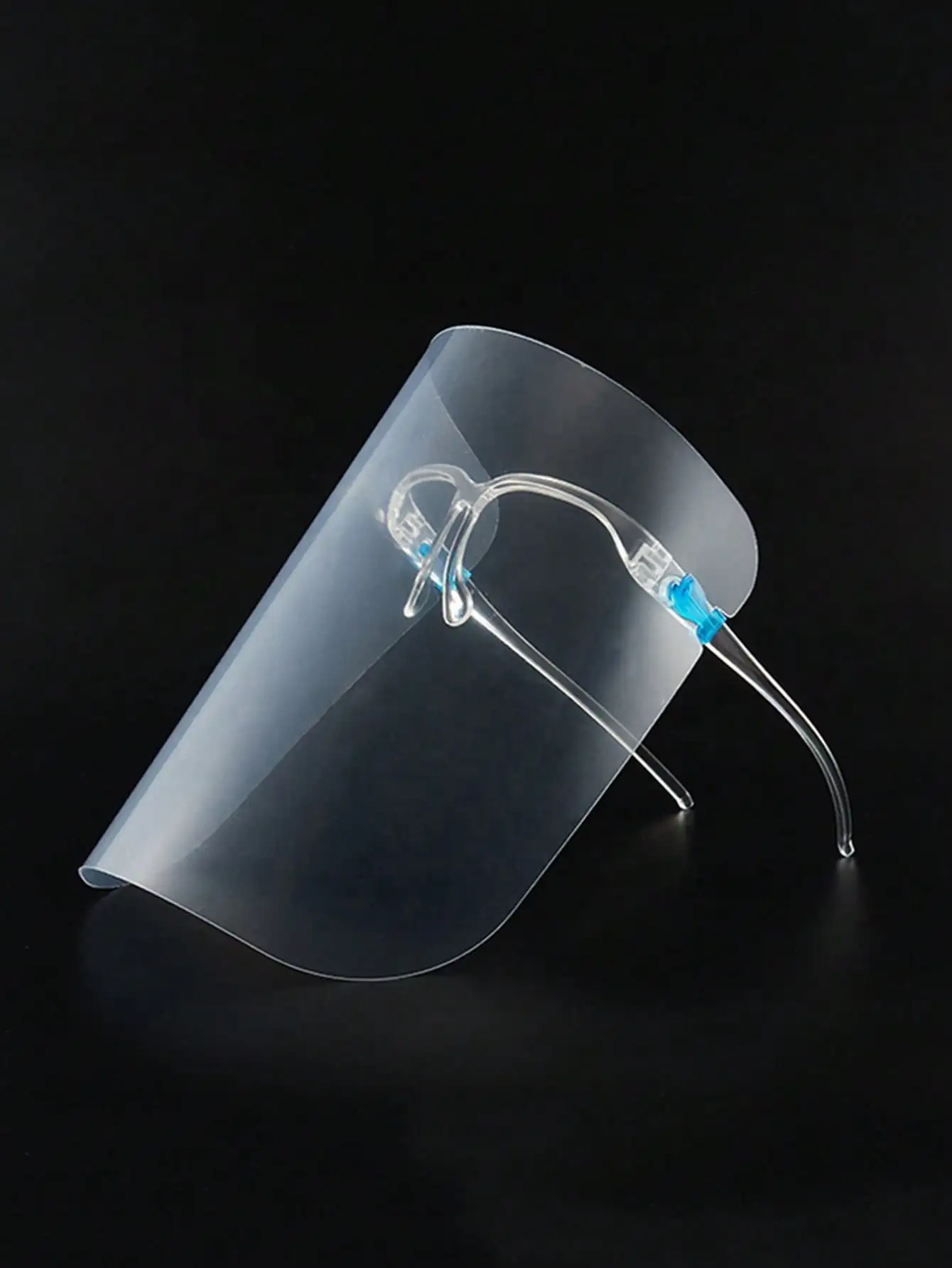 Lunettes de protection intégrale anti-poussière et anti-éclaboussures d'huile, portées par un utilisateur.