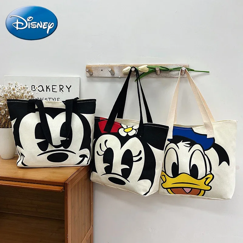 

Disney 2024 New Cartoon Mickey Minnie Ladies Handbag Student Fashion Canvas Shoulder Bag Donald Duck Large Capacity Shopping Bag