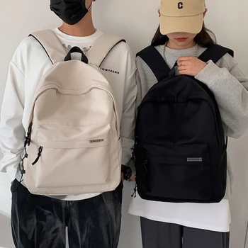 Zaino Minimalista con Ciondolo a Forma di Anatra, Tasche Multi-Scomparto, Adatto per la Scuola Quotidiana, Viaggi Casual per Uomini e Donne
