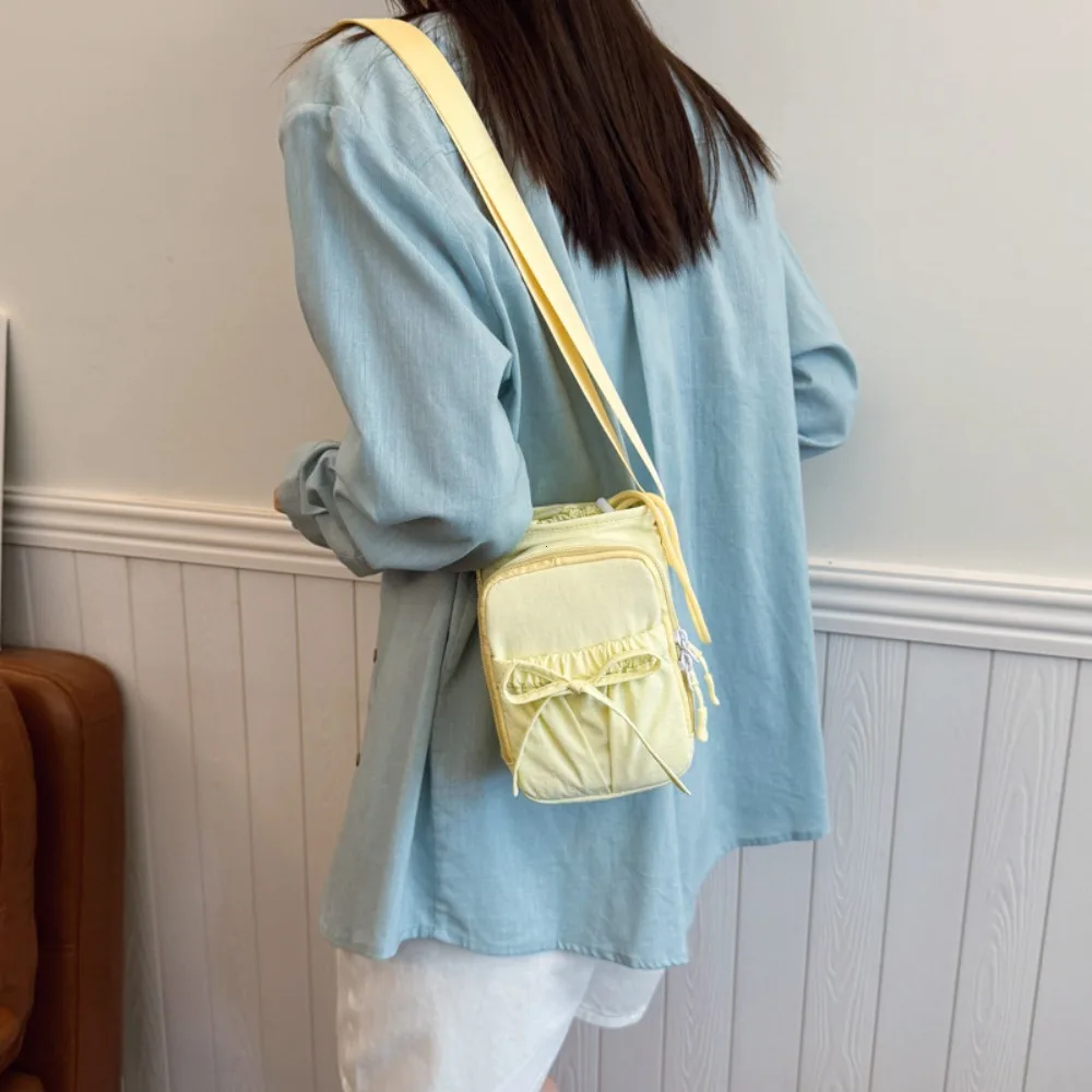 Lightweight Women's Crossbody Bag with Water Bottle Holder and Knot Design for Outdoor Sports and Travel
