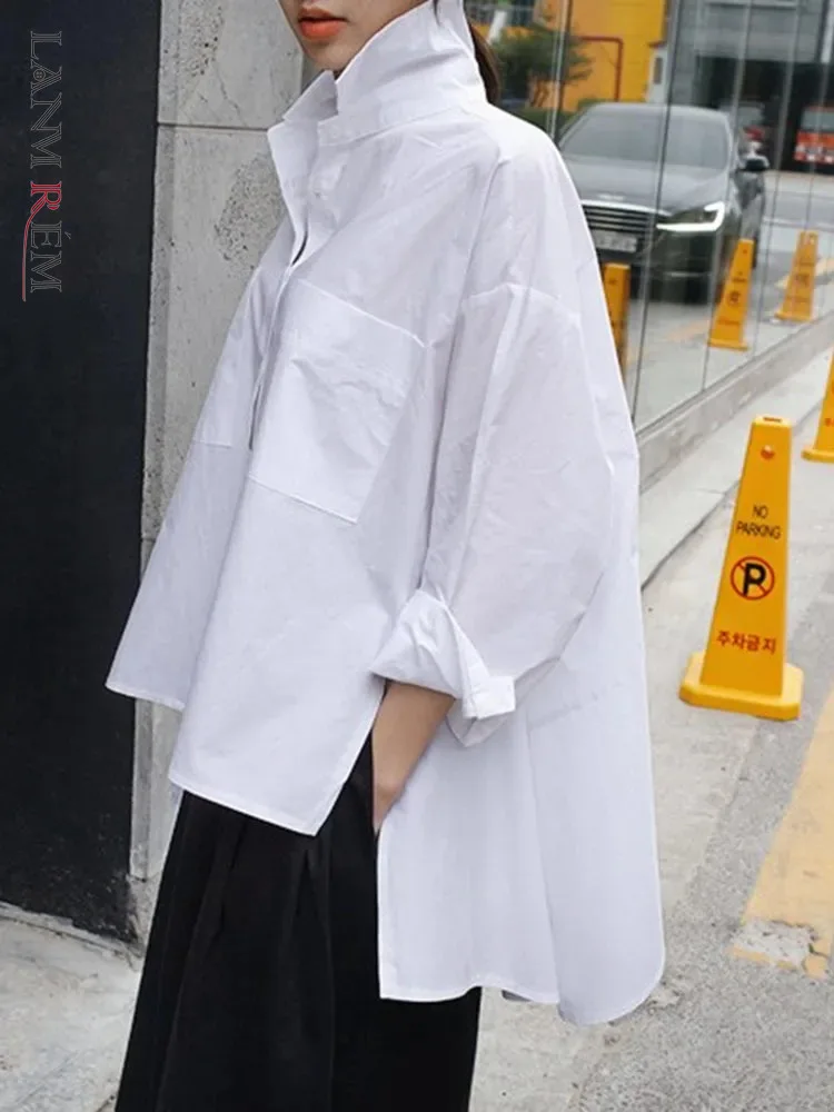 

[LANMREM] White Irregular Loose Shirts Women Single Breasted Long Sleeve Lapel Loose Blouses 2024 Spring Female Fashion Tops
