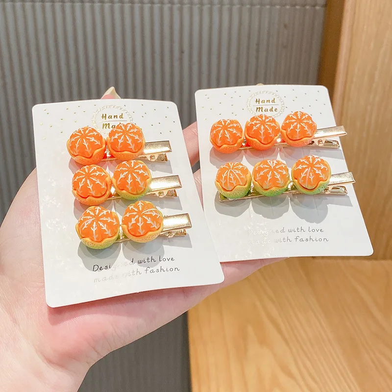 女の子のためのオレンジ色のヘアクリップ,女の子のためのかわいい