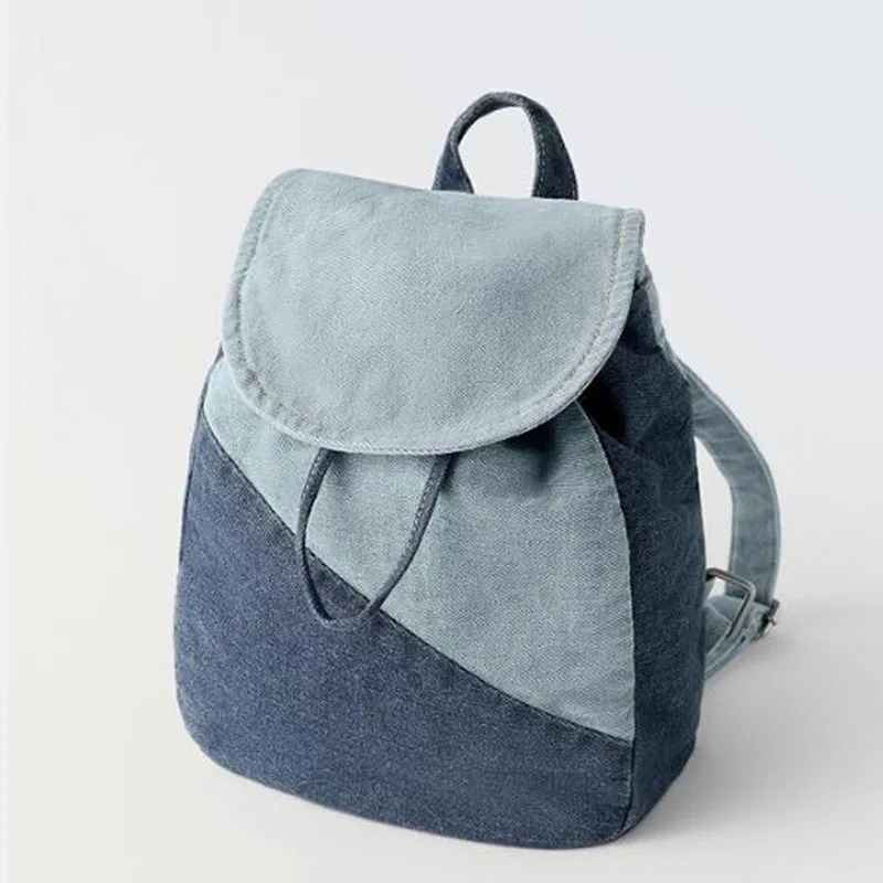 

The new washed denim finish layer splicing boys and girls' school bags or women's small backpack