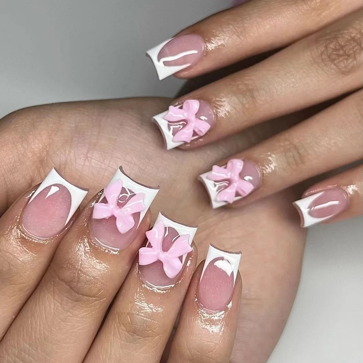 

24Pcs Press on Nails White French Tip Fake Nail Pink Full Cover Glue on Nails 3D Pink Bow Nail Charm Design Glossy False Nails