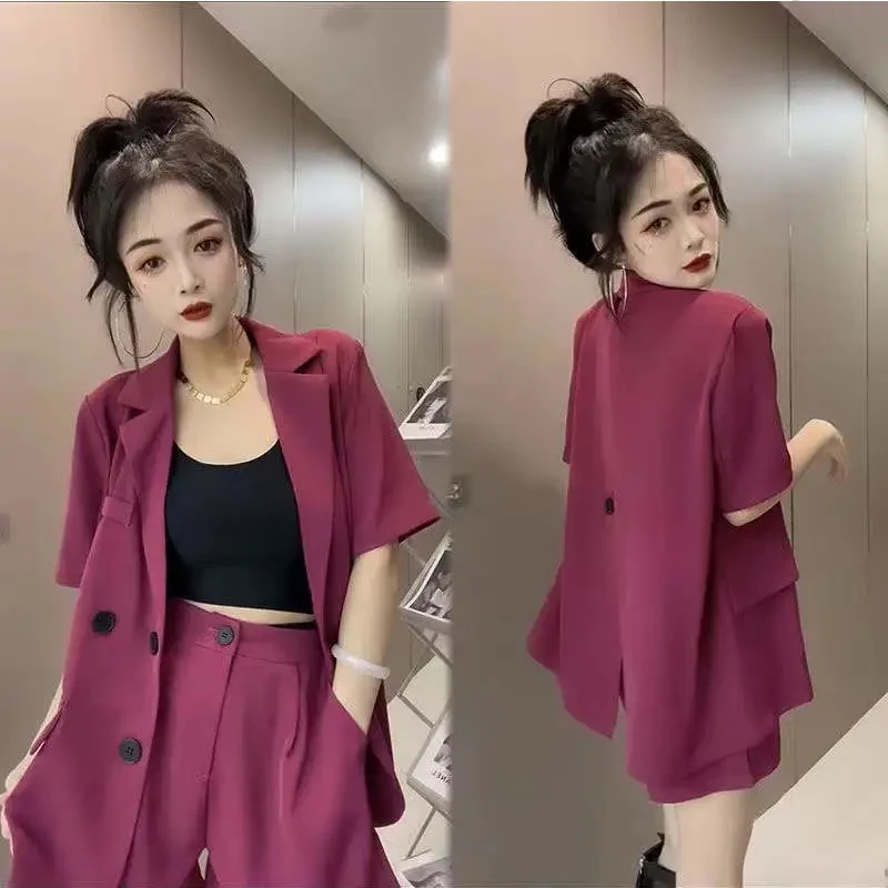 Net red suit suit female summer thin 2024 South Korean version of temperament fried street suit half sleeve shorts two pieces women s temperament of 2023 new leisure v neck chalaza of tall waist high street bubble short sleeved wide legged jumpsuit women