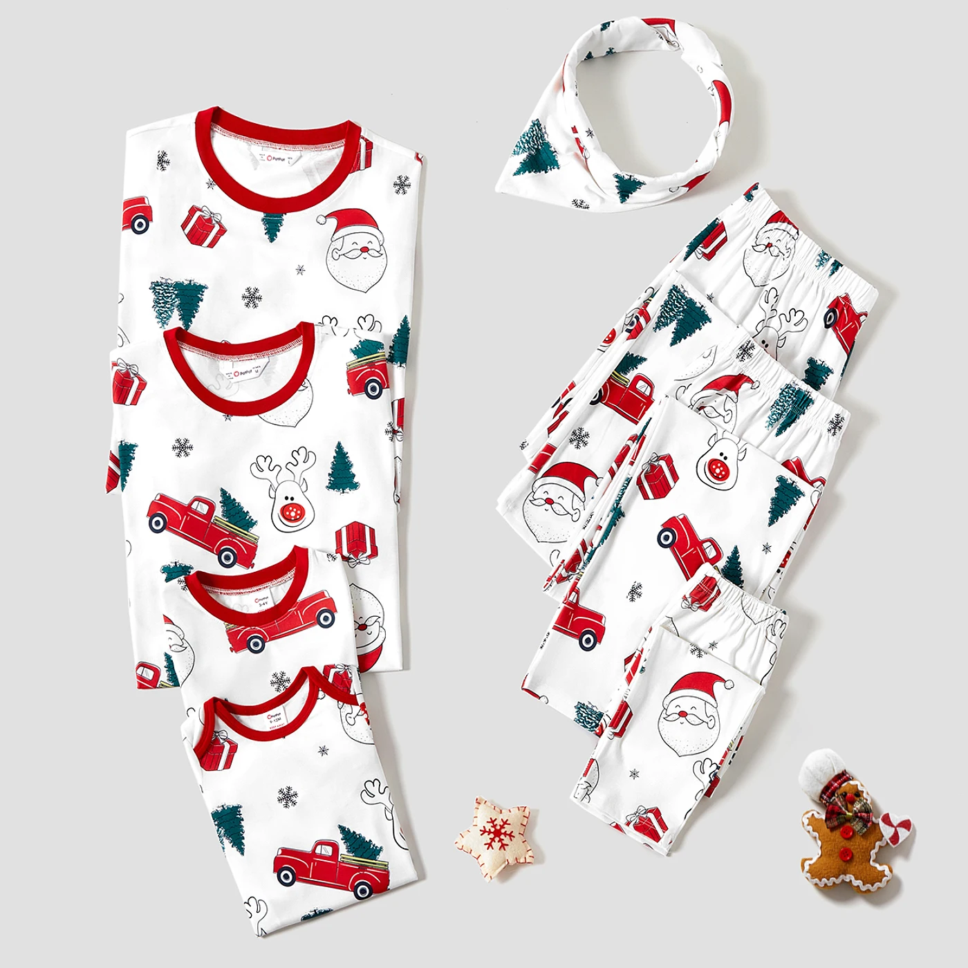 thumbnail image 1 of Conjuntos de pijamas a juego para toda la familia con estampado de Papá Noel y baúl navideño (resistentes al fuego), 1 of 5