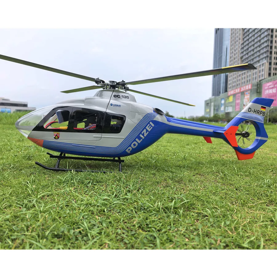 Hélicoptère RC RTF prêt à voler en action, vue de côté, mode1 ou mode2, livraison rapide