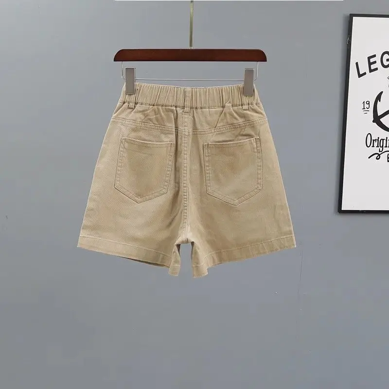 Women's 2024 Summer New Spliced Button Zipper Pocket Fashion Solid Color High-waisted Loose Minimalist Straight Denim Shorts