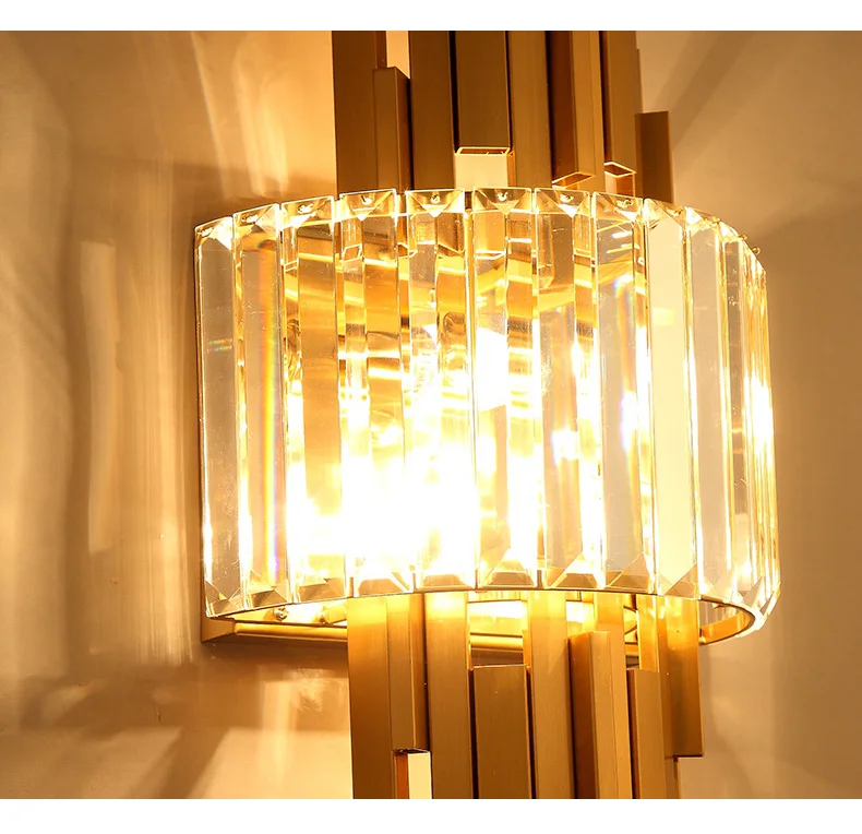 The Luxury Geometric Wall Sconce features contemporary vertical glass panels that emit a warm glow, enhancing your space with an elegant touch of home decor.