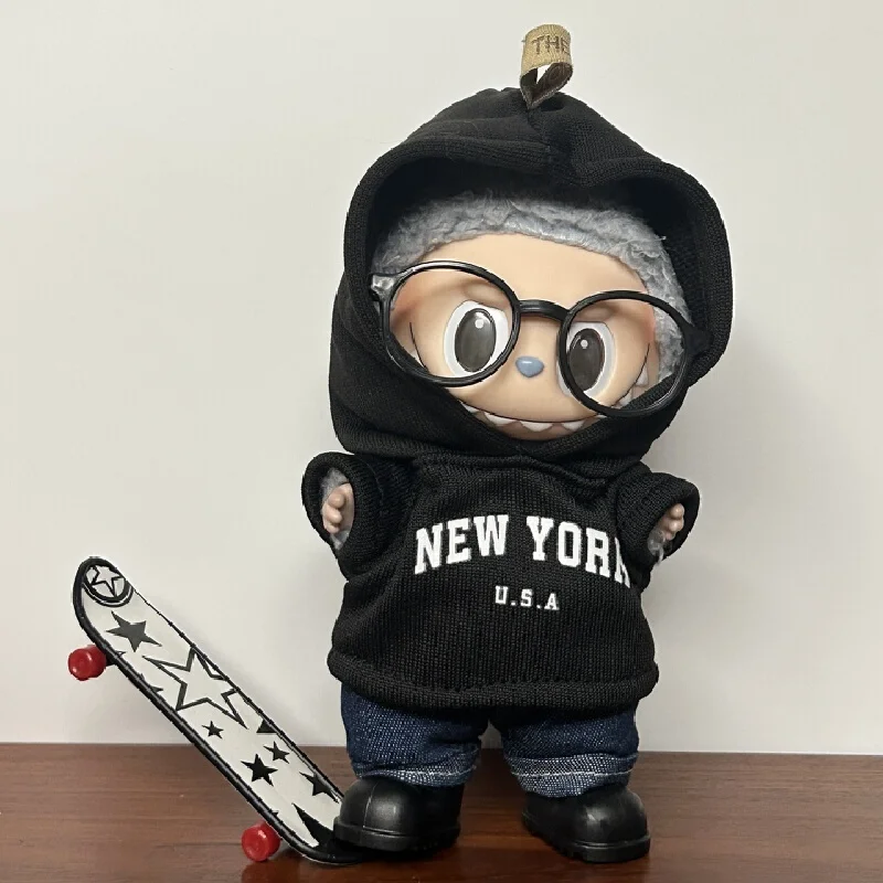 Stylish New York-Inspired Hoodie and Jeans Outfit with Glasses