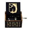 Hand-cranked music box, retro engraving, exquisite painting, attacking giants, the same creative ornament, wooden music box 2