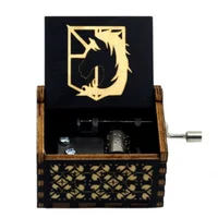 Hand-cranked music box, retro engraving, exquisite painting, attacking giants, the same creative ornament, wooden music box 2