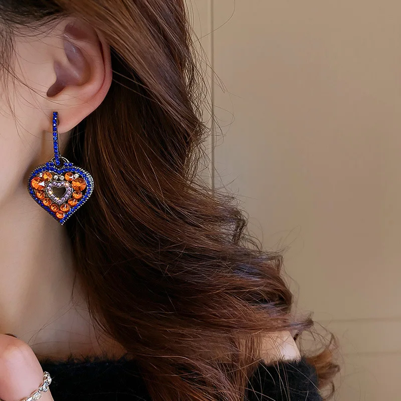 

Inlaid Shiny Stone Colorful Love Earrings Fashion Retro Ethnic Style Hollow Earrings Creative Temperament Earrings Wholesale