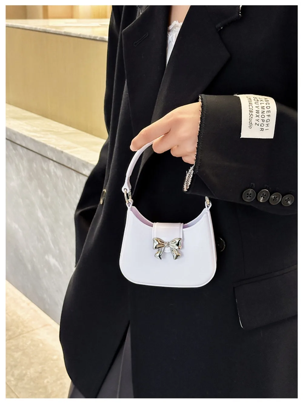 Vielseitige Mini-Hand-Zipfeltasche mit Schleife, Dekoration, Bonbonfarben, Umhängetasche, neue modische Handtasche mit Kette, Damen- und Mädchen-Mondtasche – Detail 2