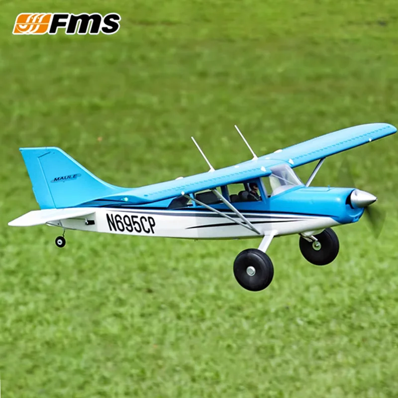Planeur RC RTF ou PNP avec flotteurs, en vol au-dessus d'un lac, prêt à voler sur eau et terre