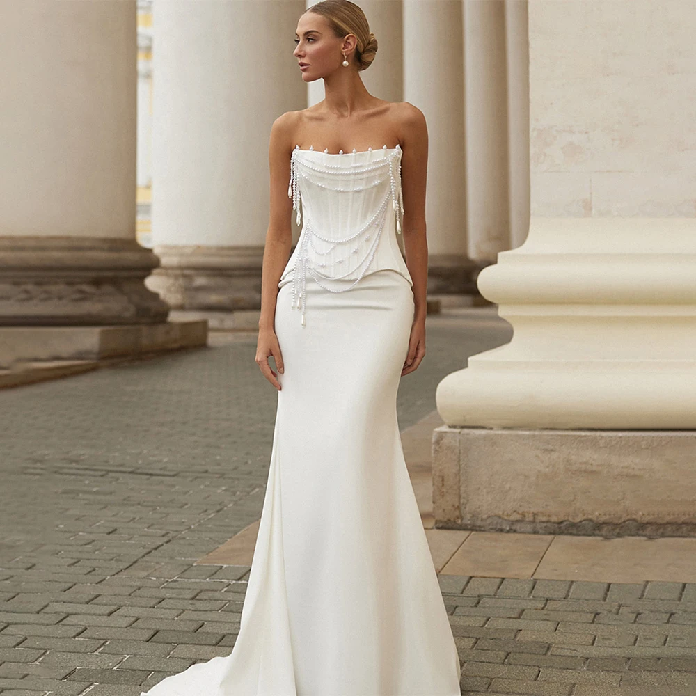 Robe de mariée sirène élégante sans bretelles, longueur ras du sol, dos nu, corset, style bohème, personnalisable pour les mariées