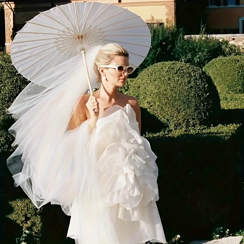 A white paper umbrella for wedding decoration-handmade traditional Chinese bridal sunshade-photo prop and party accessory