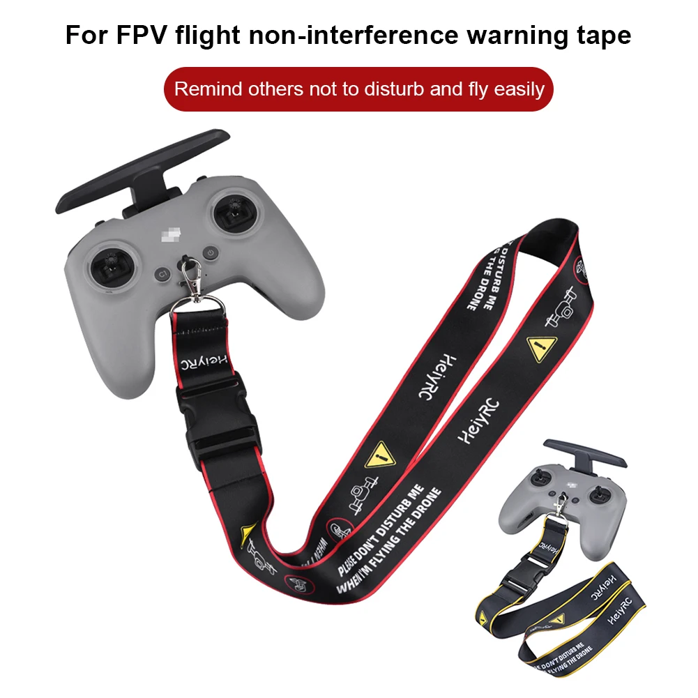 Détail du clip de la lanière de cou pour télécommande drone, assurant une fixation sécurisée