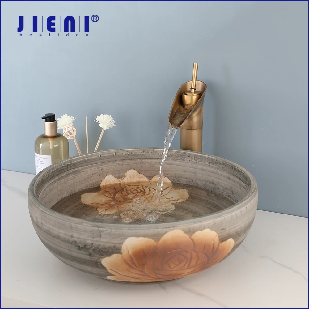 

JIENI коричневый художественный керамический набор для раковины в ванной комнате пион картина керамическая раковина водопад античный латунный Смеситель для ванной кран