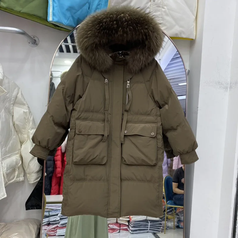 

Женская длинная куртка-пуховик на белом утином пуху, с капюшоном