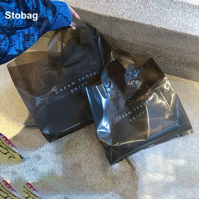 https://ae01.alicdn.com/kf/Sce01873bd6a749b4a1670d80e20ab4fa1/StoBag-50pcs-Transparent-Black-Shopping-Tote-Bag-Plastic-Clothes-Gift-Packaging-Pouch-Handbag-Portable-Custom-Logo.jpg