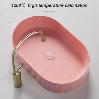 ศิลปะอ่างล้างจานเซรามิคสีชมพูห้องน้ํา Vanity อ่างล้างหน้าโมเดิร์นชามเดี่ยวห้องน้ํา Art อ่างล้างหน้าสําหรับติดตั้งเคาน์เตอร์ 2