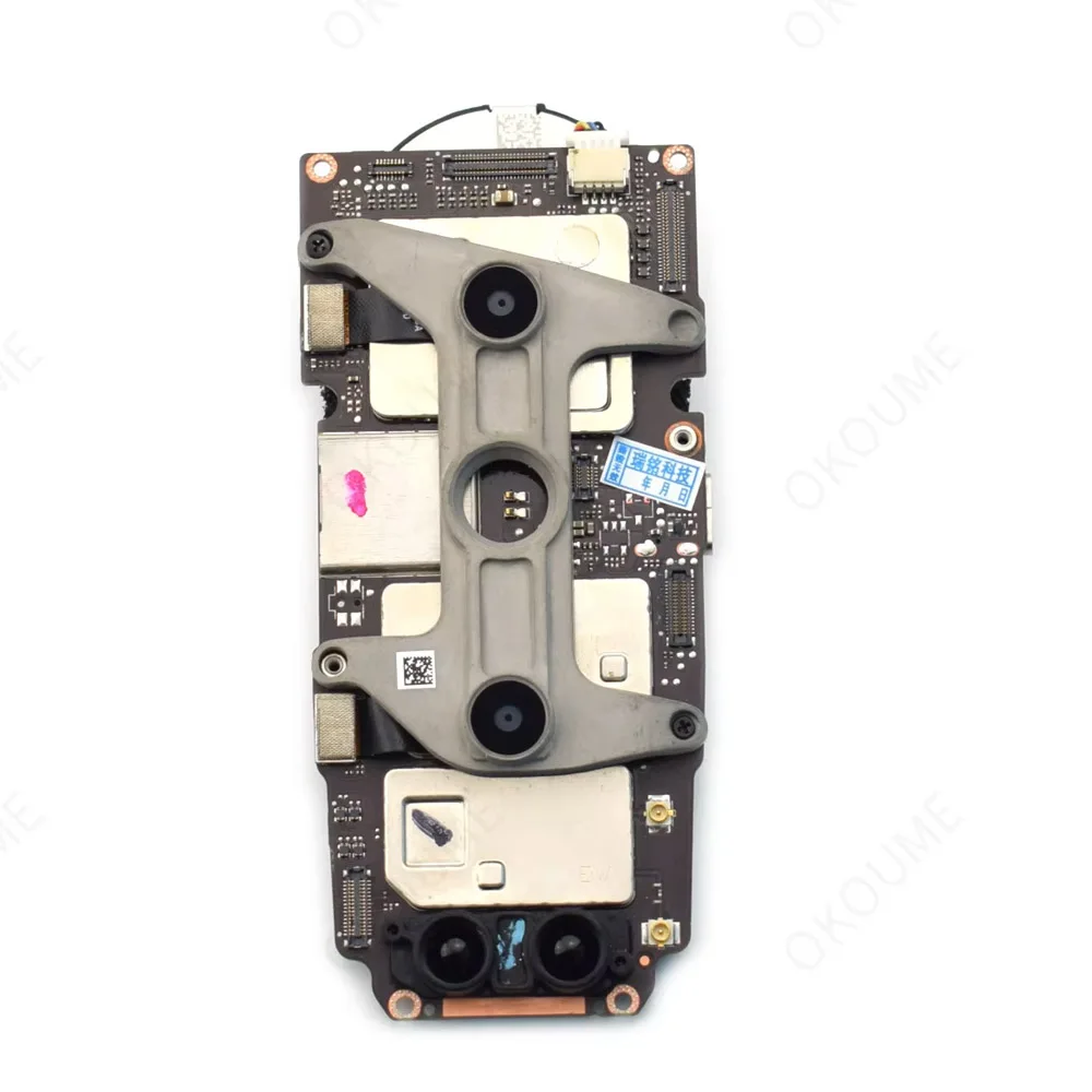 Carte mère de rechange DJI Mavic Air 2 avec ventilateurs, connecteurs et puces électroniques visibles.