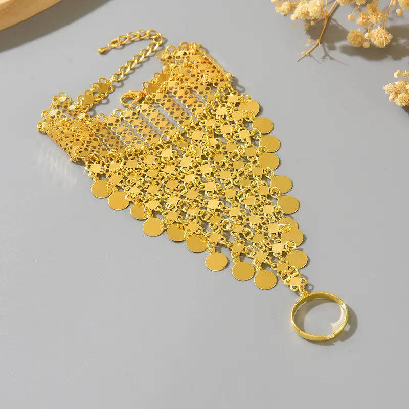 A Retro Ethnic Style Metal-Gilded Hollow-Carved Round Pendant Tassel Personalized Design Finger Chain - Image 2