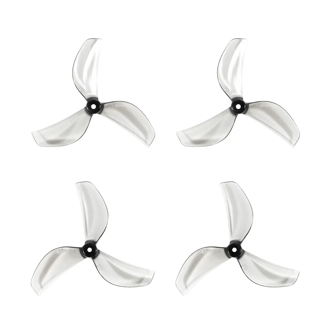 Détail des hélices Gemfan 45mm pour drone FPV course, pales orange vif.