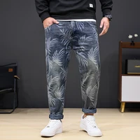 8XL oversized jeans men's fashion leaf printed trendy casual stretch denim plus sizes loose 150kg fat pants 1