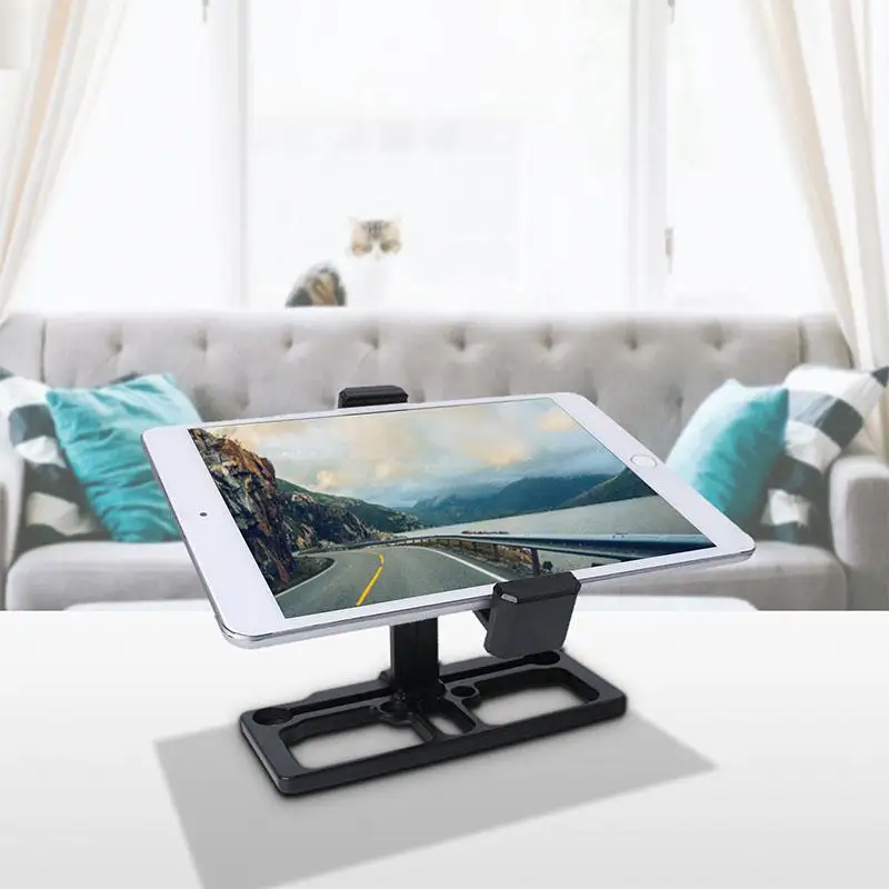 Support téléphone avec télécommande pour drone DJI installé sur manette, vue de dessus.